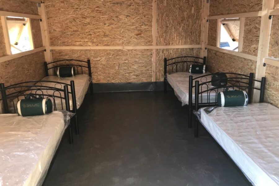 Covid beds, 2021 in Greek refugee camp.